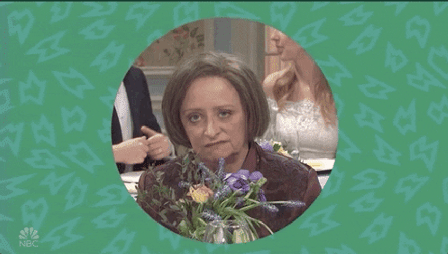 Debbie Downer Smelling Flowers GIF