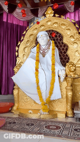 Deity Sitting On Gold Chair GIF