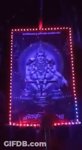 Deity Surrounded By Blue And Red Lights Kerala GIF