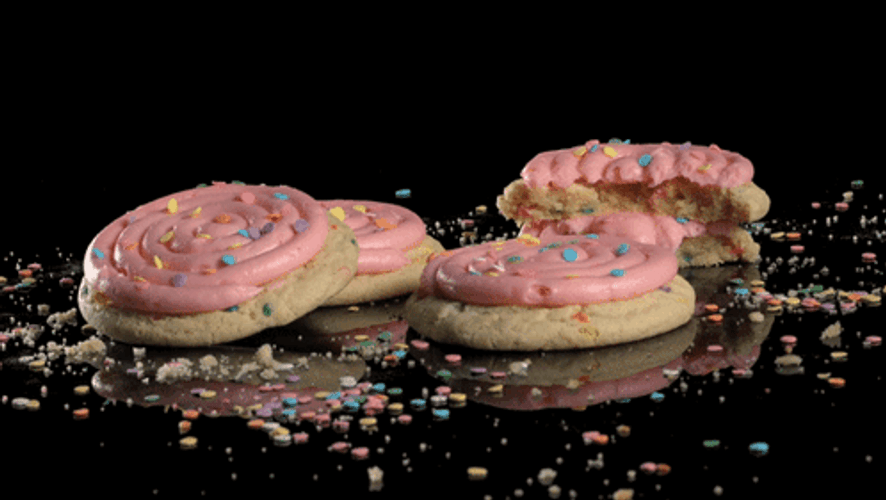 Delectable Cookie With Swirly Pink Topping GIF