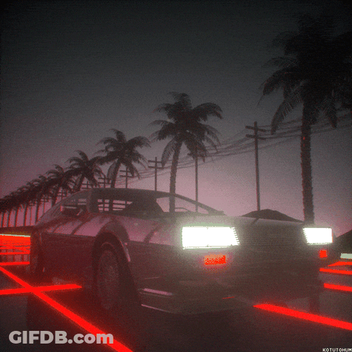 Delorean Driving On The Road At Nighttime GIF