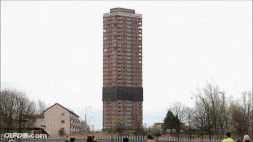 Demolition Team Demolishing Tall Building GIF