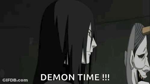 Demon Holding Mask With Horns Saying Demon Time GIF
