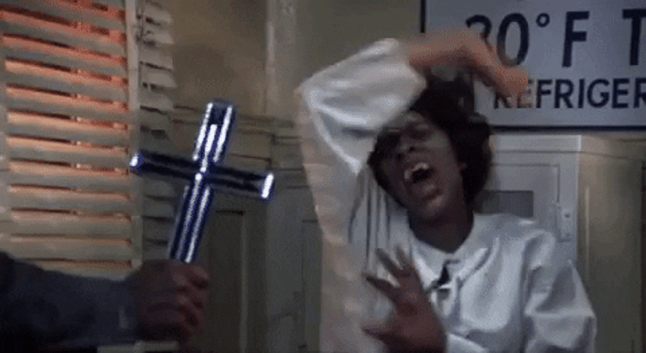 Demon Possessed Fearing A Cross GIF