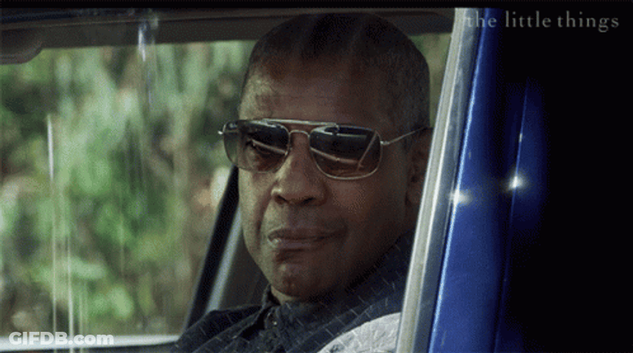 Denzel Washington Awkward Smile In Dark Shades GIF