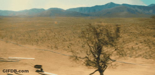 Desert Landscape With Mountains And Tree GIF