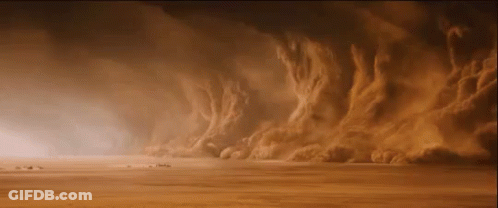 Desert Sandstorm With People In Distance GIF