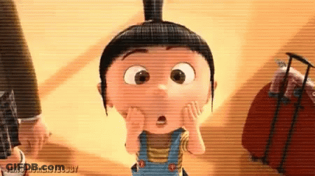 Despicable Me Character Surprised Next To Suitcase GIF
