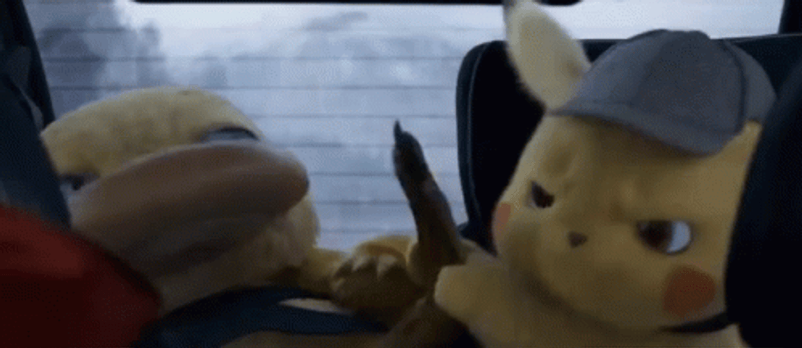 Detective Pikachu Giving Psyduck Foot Massage GIF