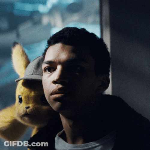 Detective Pikachu On Harry Goodman Shoulder GIF