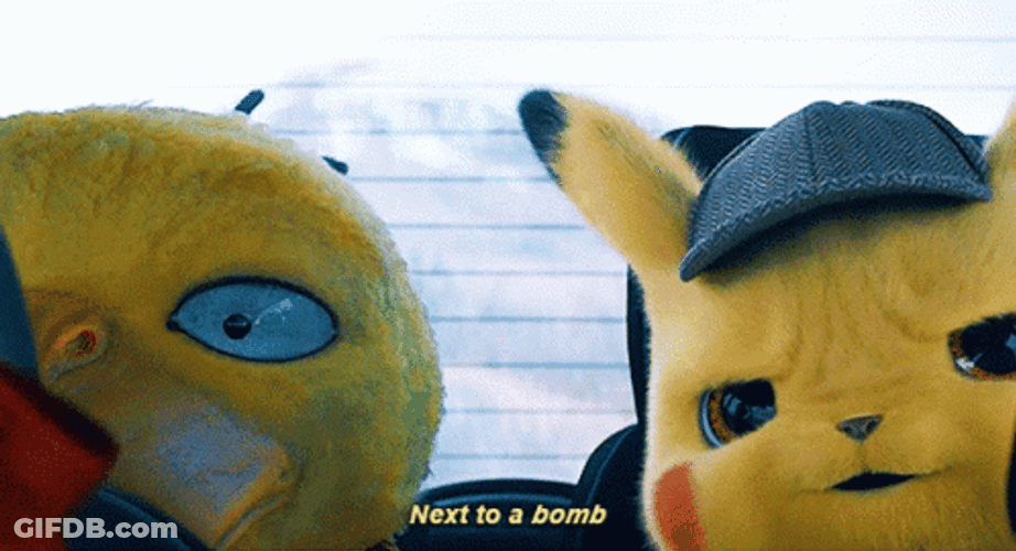 Detective Pikachu Sitting Next To Psyduck GIF