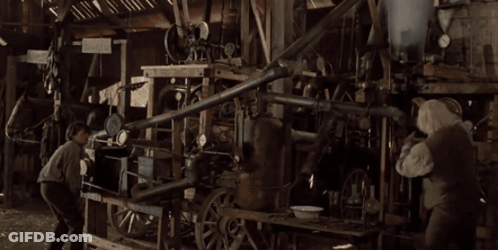 Devil Statue With Horns Walking Down Street GIF