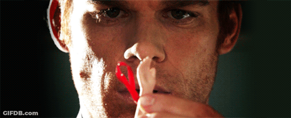 Dexter Morgan Checking Out Doll Hand GIF