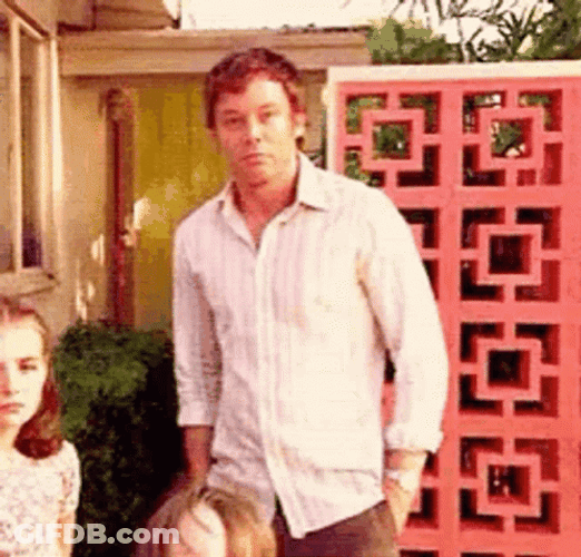 Dexter Morgan Shoulder Shrug GIF