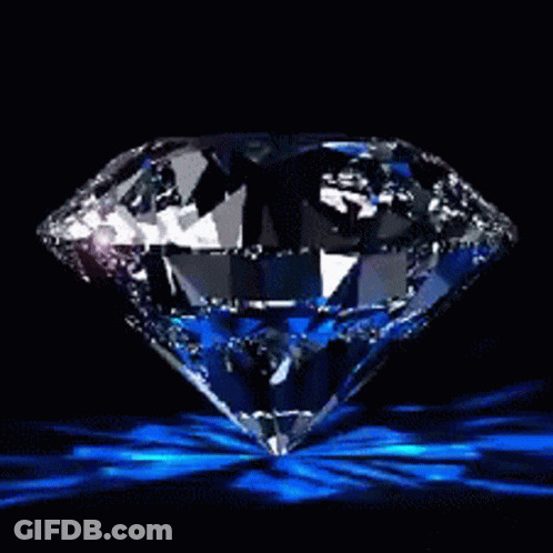 Diamond With Blue Bow On Black Background GIF