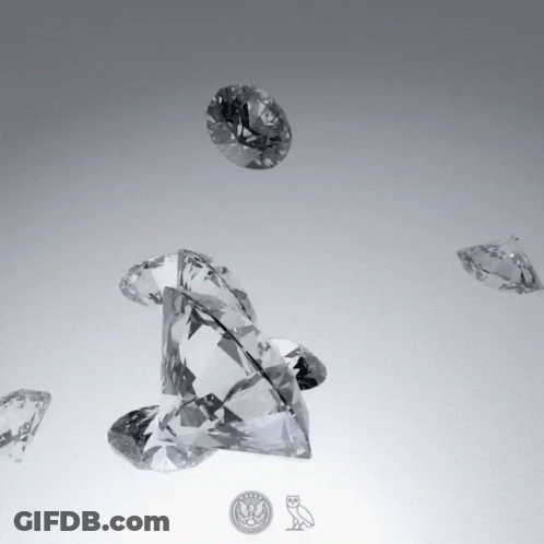 Diamonds On Table With US Coin GIF