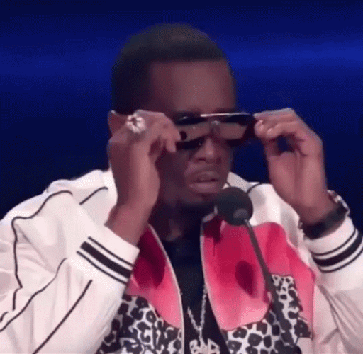 Diddy Removing Sunglasses GIF