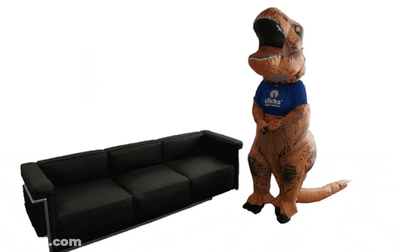 Dinosaur Costume Lying On The Couch GIF