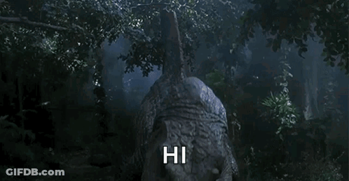 Dinosaur In Forest Saying Hi GIF