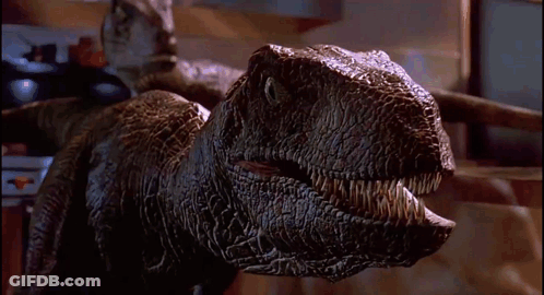 Dinosaur Standing On Kitchen Counter GIF