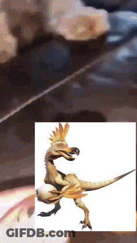 Dinosaur With Feathers On Head GIF