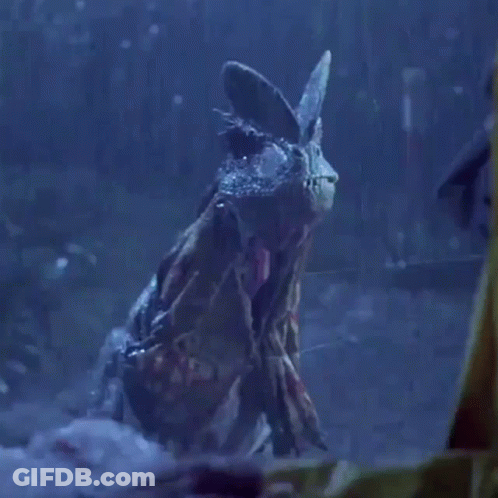 Dinosaur With Mouth Open And Sharp Teeth GIF