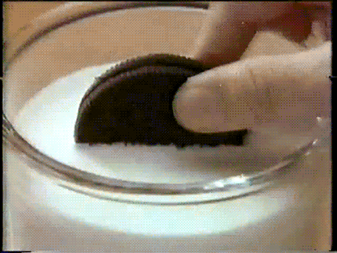 Dipping Oreo In Milk GIF