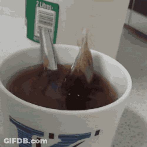 Dipping Tea Bag In A Cup GIF