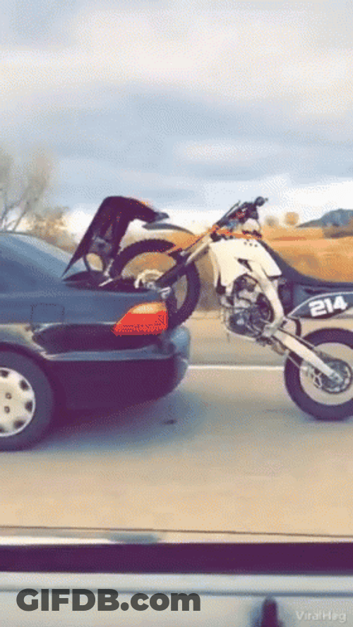 Dirt Bike Piggyback Riding On Car GIF