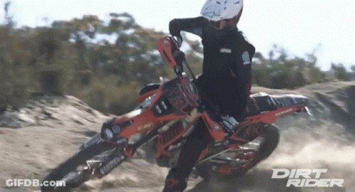 Dirt Rider Riding Motorcycle On Dirt Road GIF