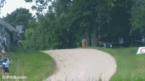 Dirt Road With Gatorade Sign GIF