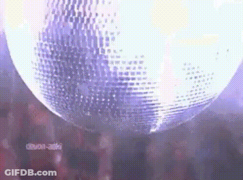Disco Ball Hanging In Dark Room GIF