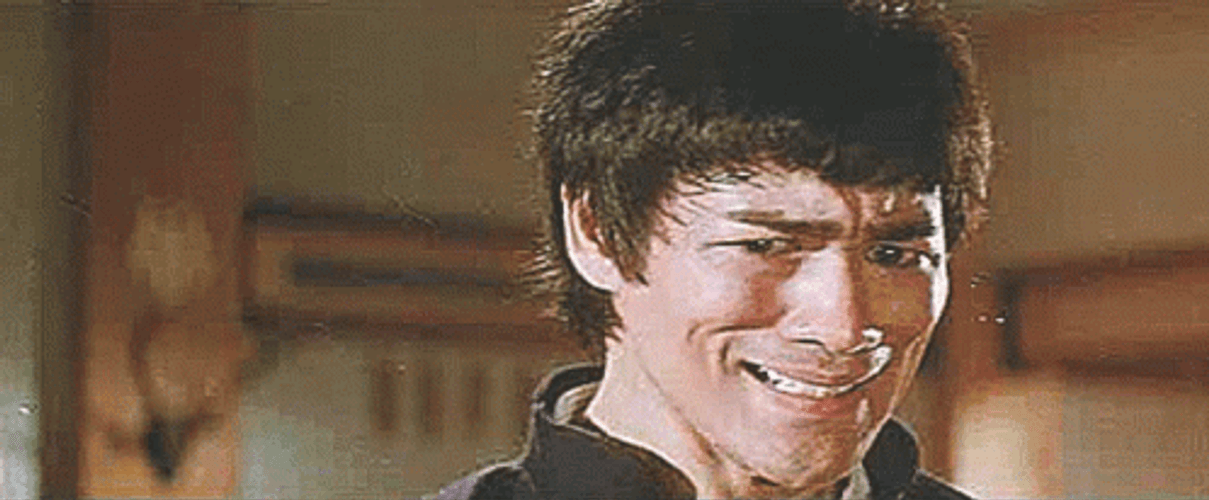 Disgusted Bruce Lee Expression GIF