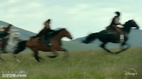 Disney Logo Group Riding Horses In Field GIF