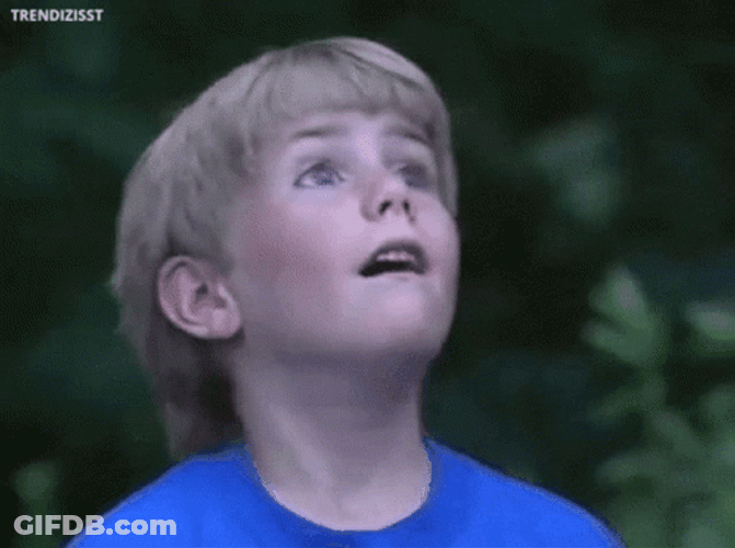 Distracted Little Boy Looking Everywhere GIF