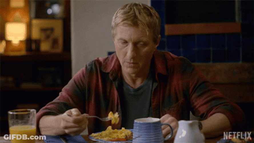 Distracted While Eating Pasta GIF