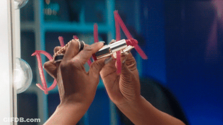 Diva Lipstick Mark In The Mirror GIF