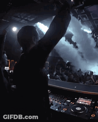 DJ Playing Music With Hand Up GIF