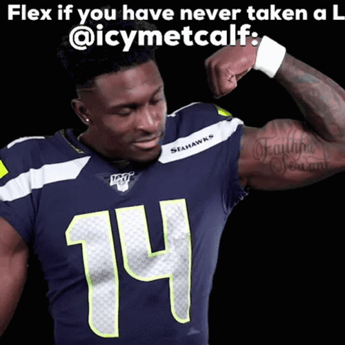 DK Metcalf Showing Off Muscle GIF