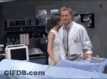 Doctor And Nurse Kissing GIF