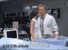 Doctor And Woman Standing In Hospital Room GIF