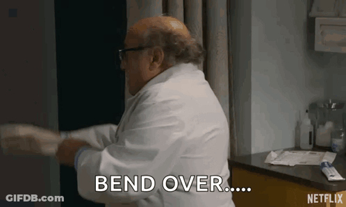 Doctor In White Coat Bending Patient's Arm GIF