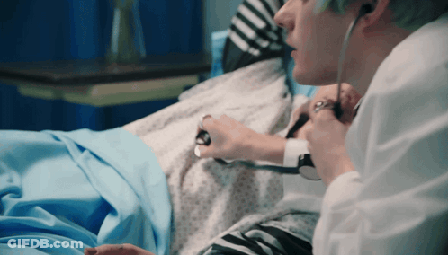 Doctor Listening With Stethoscope GIF