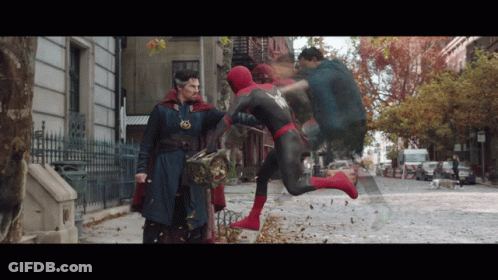 Doctor Strange And Spider-Man Are Standing On A Street GIF