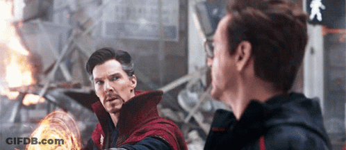 Doctor Strange And Tony Stark Standing Next To Each Other GIF