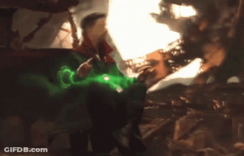 Doctor Strange Is Holding A Green Glowing Object In His Hand GIF
