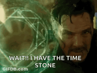 Doctor Strange Is Standing In Front Of A Glowing Object And Says `` Wait ! I Have The Time Stone '' . GIF