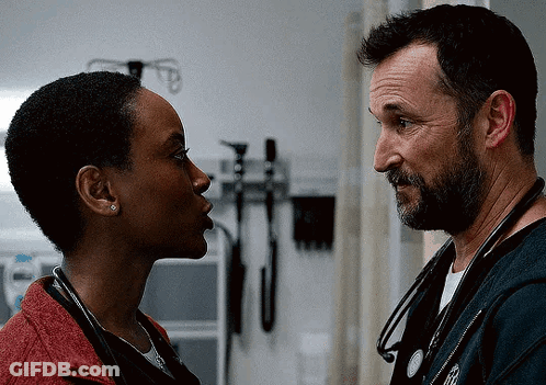 Doctor Talking To Patient With Syringe And Stethoscope GIF
