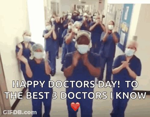Doctors In Masks And Scrubs Applauding GIF