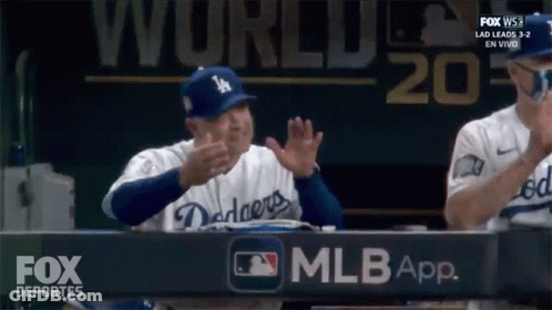 Dodgers Baseball Player Applauds In Front Of Fox Deportes Sign GIF